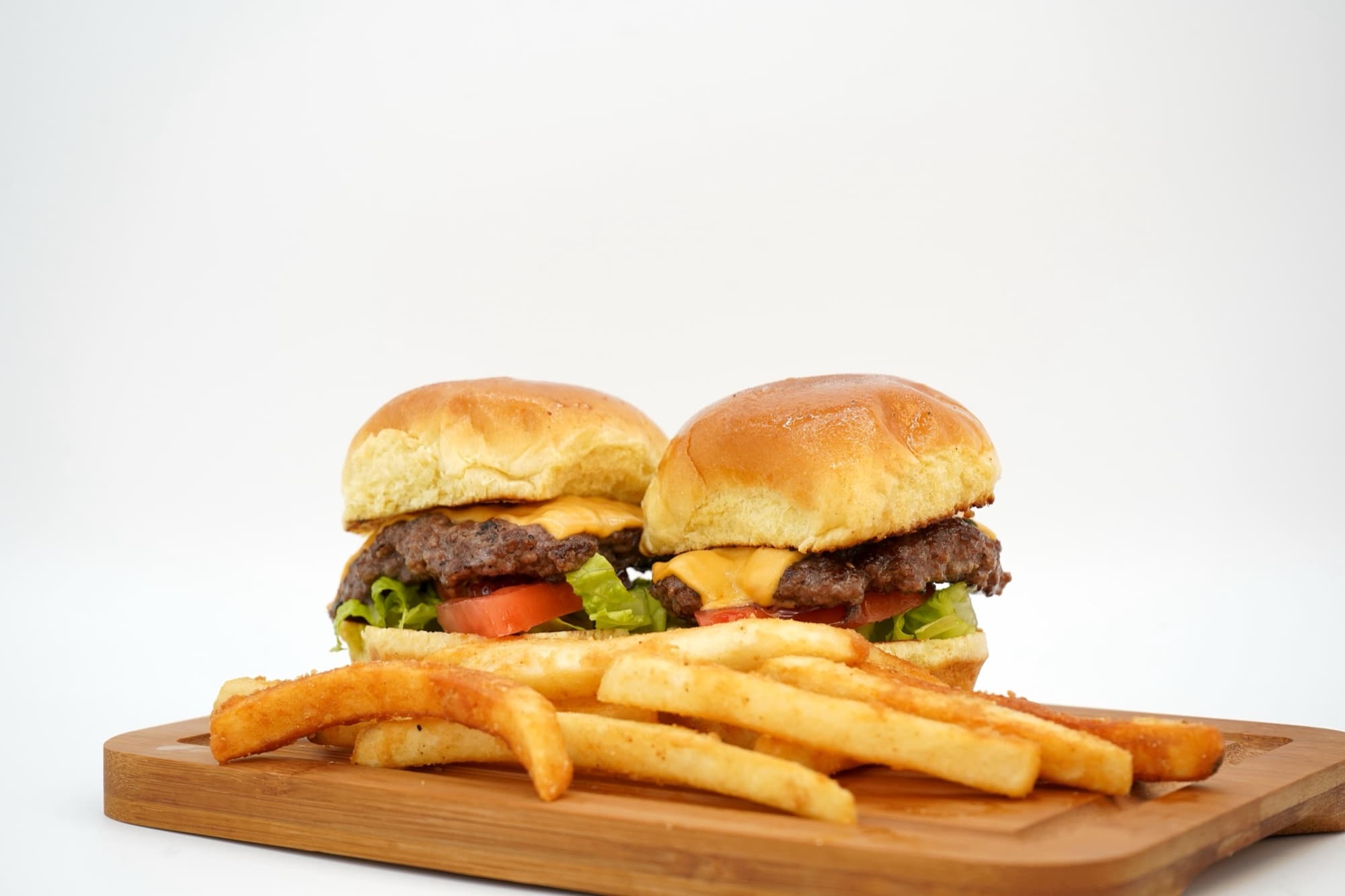 A tray of Moe'z original burger sliders and fries, great for group catering orders